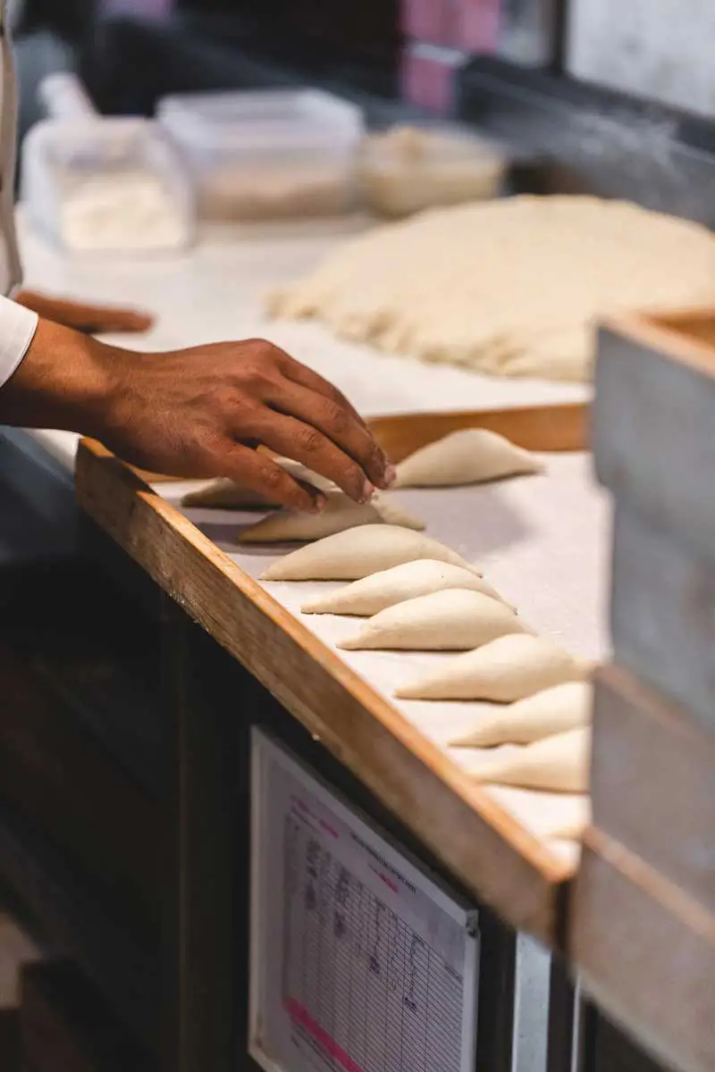 Baker making bread