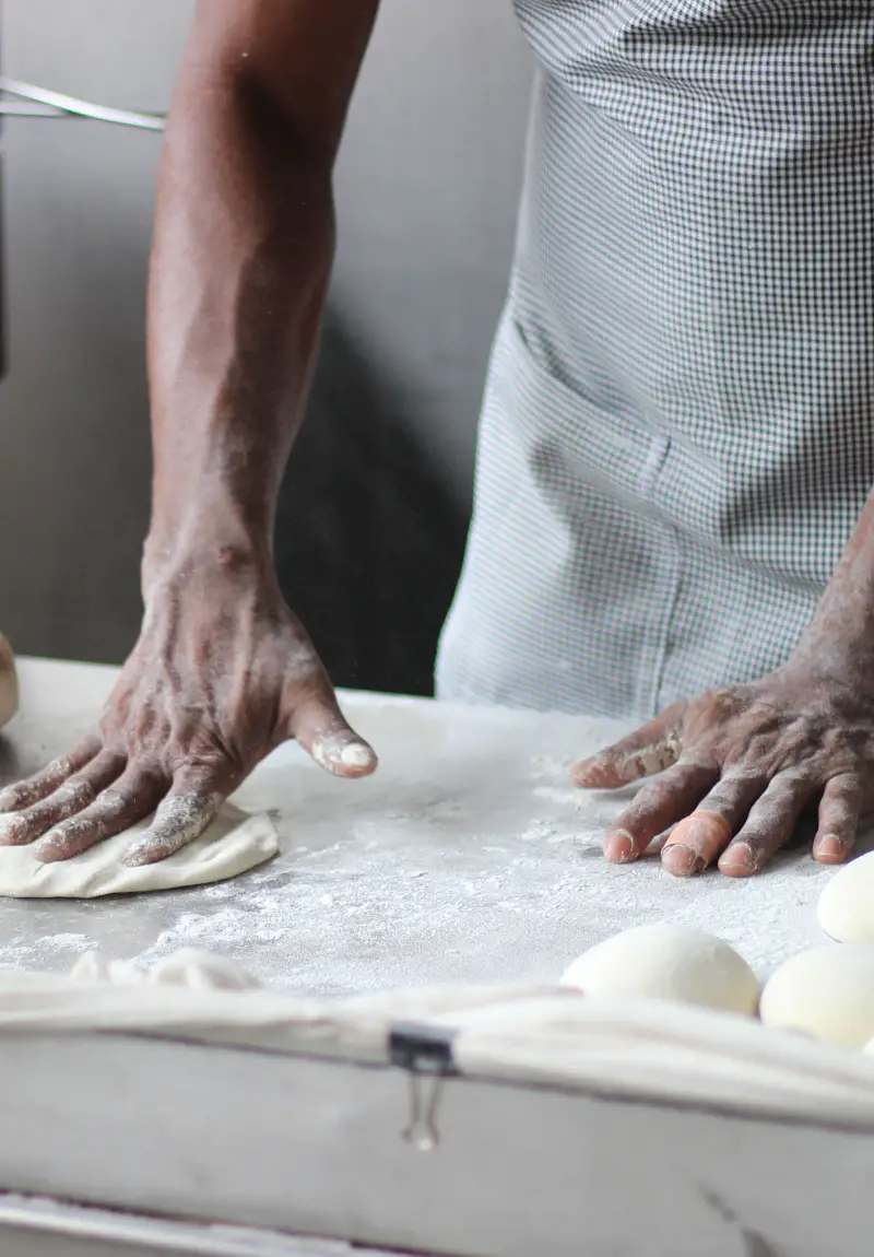 Baker kneading dough